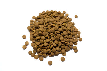 Dry food for cats and dogs on a white background.の写真素材