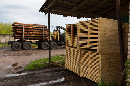 Detail of wooden planks. Wooden pallets. Wood. Lumber. A stack of new wooden planks in the lumber industry.の写真素材