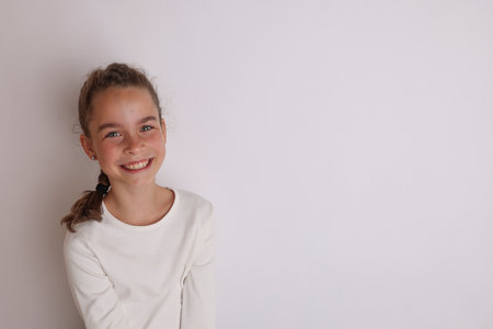  white teen girl Little emotional teen girl in white shirt 11, 12 years old on an isolated  white background. Childrens studio portrait. Place text, to copy space for  inscription, advertising childrens goods.の素材 [FY310198372463] | ストックフォトの
