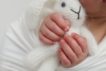 Sleep of a newborn in the first days of life. Portrait of a newborn one week old baby with a cute...