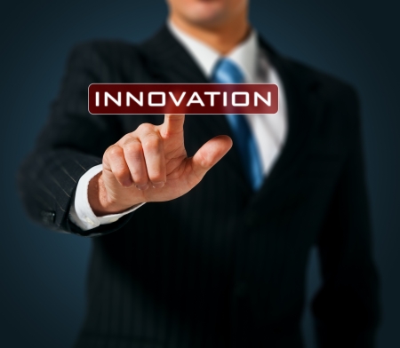 Man pushing on a touch screen interface. Innovationの写真素材