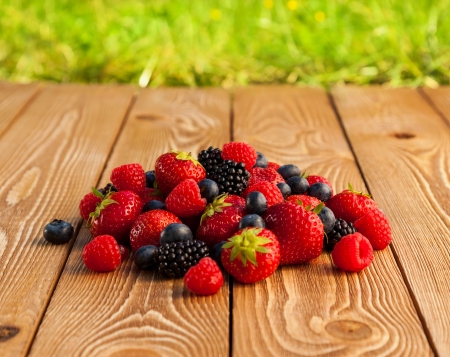 Berries on Wooden Background.の写真素材