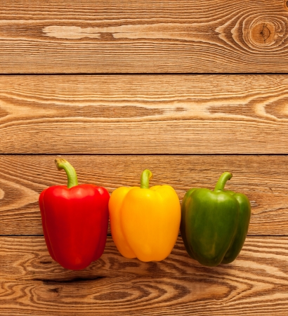 Peppers on a wooden backgroundの写真素材
