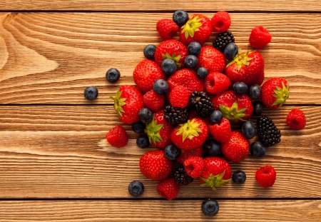 Berries on Wooden Background.の写真素材