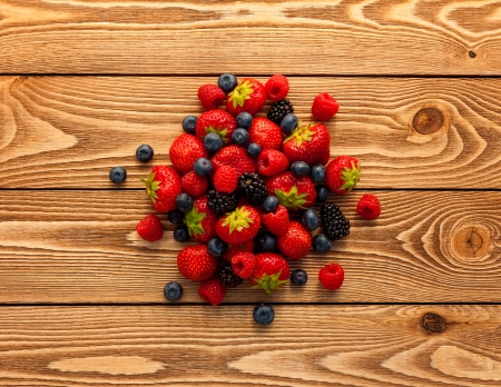 Berries on Wooden Background. Berries on Wooden Background.