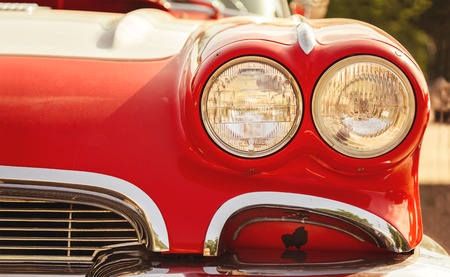 Close-up photo of retro car headlights の写真素材