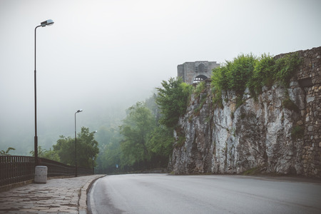 Empty road in fog in Bulgariaの写真素材