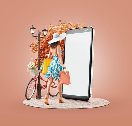 Unusual 3d illustration of a Happy woman with shopping bags going to big smartphone and using smart phone application. Smartphone apps concept. Consumerism and shopping.の写真素材