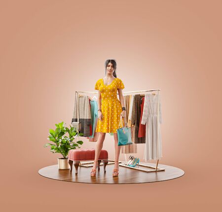 Unusual 3d illustration of a beauty woman in casual clothes standing in boutique. Cloth market. Online shopping concept.の写真素材