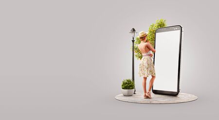 Pretty woman in summer dress standing in front of smartphone and using smart phone application. Smartphone apps concept. Unusual 3d illustrationの写真素材