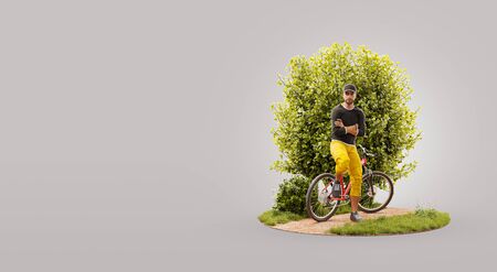 Professional cyclist standing at his mountain bike outdoors on sunny day. Cycling concept. Unusual 3d illustrationの写真素材