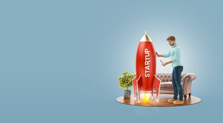 Young businessman launching a spaceship at his office. Startup concept. Unusual 3d illustrationの写真素材