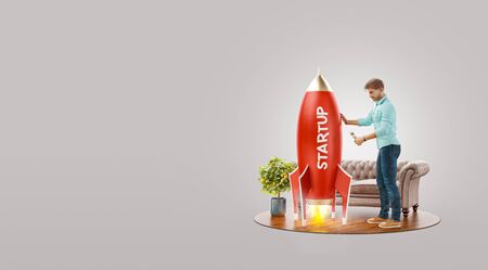 Unusual 3d illustration of a young businessman launching a spaceship at his office. Startup concept.の写真素材