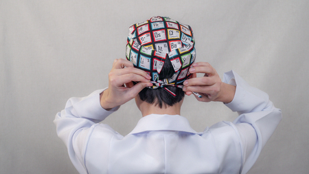 The doctor puts a surgical cap, staticの写真素材