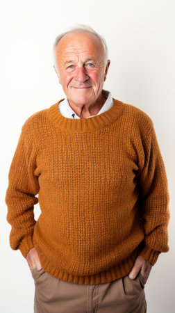 Stock image of an elderly man in a cozy sweater on a white backdrop Generative AIの素材