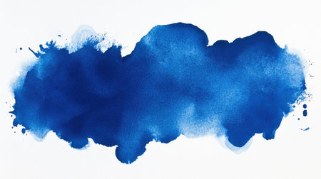 A broad splash of rich blue watercolor creates an artistic backdrop against a clean white surface, ideal for various creative applications and designs.の素材