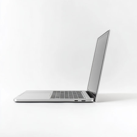 A slim silver laptop is positioned on a clean, white surface, highlighting its elegant design and advanced features, perfect for work or leisure in a contemporary setting.の素材