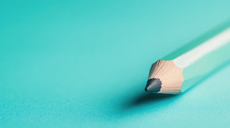 Soft pastel teal serves as the backdrop for subtle pencil strokes and dots, creating an inviting minimalist aesthetic that emphasizes simplicity and creativity.の素材