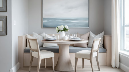 The small dining nook features a round table set with elegant dinnerware, surrounded by pastel-colored pillows and chairs, creating a warm atmosphere for relaxed dining.の素材