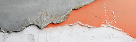 A blend striking of coral and gray hues on a textured wall reveals intricate details of the plastering work. The elegant transition highlights the craftsmanship and artistic appeal of the design.の素材