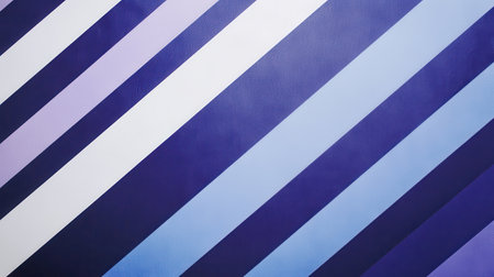 Stripes transition seamlessly from dark purple to royal blue, creating a vivid and textured background. The smooth diagonal lines enhance the visual depth and modern aesthetic.の素材
