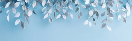 Hanging branches adorned with lilac and silver leaves softly sway against a calming pastel blue backdrop, creating an atmosphere of elegance and tranquility perfect for peaceful reflection.の素材