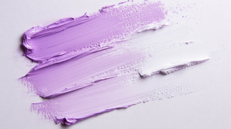 Soft brushstrokes of pastel lavender and pink blend smoothly into white, showcasing an incomplete but beautiful modern art piece that evokes creativity and calmness.の素材