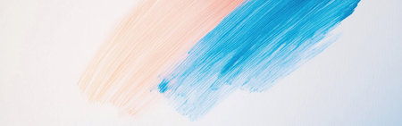 A minimalist white canvas features a single bold brushstroke in blue and soft pink. This striking artwork captures a moment of creative expression in an artistic setting.の素材