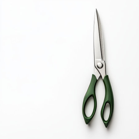A pair of sharp gardening shears rests on a clean surface, prepared for use in trimming and maintaining plants in a home garden this summer, ensuring vibrant growth and health.の素材