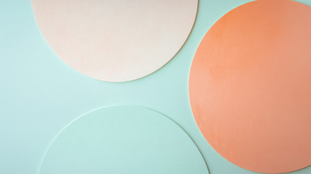 The artwork features overlapping half-circles in mint and peach colors, creating a soothing and balanced composition. This design showcases simplicity and elegance in color selection.の素材