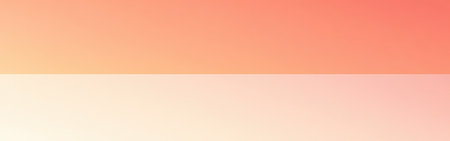 A gentle blend of pastel coral and amber hues creates a calming atmosphere as the colors fade into each other, marking the transition from day to night at dusk.の素材