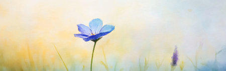 A solitary blue flower stands gracefully on a slender stem, surrounded by a gentle blur of soft colors. The warm hues suggest early morning light, enhancing the tranquil garden ambiance.の素材