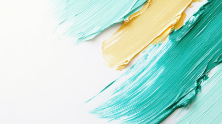 Turquoise and gold paint are applied with a pencil on a pristine white background, showing a blend of vibrant colors. This artwork reflects a minimalistic and fresh design.の素材