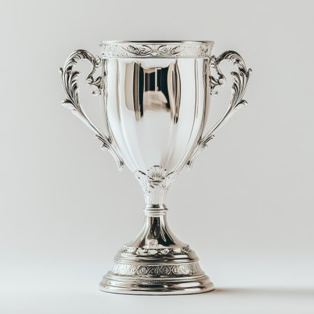 This exquisite silver trophy cup boasts intricate decoration and polished surfaces, symbolizing excellence and victory in a competitive event or championship.の素材