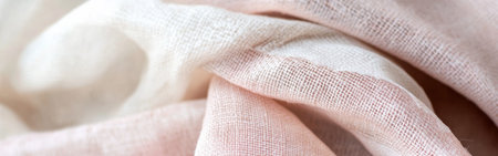This soft pink and white burlap fabric features a delicate, faded design that adds charm to any crafting project. Ideal for home decor or DIY creations, it invites creativity.の素材
