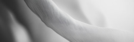 Delicate pencil strokes in muted gray tones softly illuminate the contours of a human hand, capturing the graceful curves and subtle textures in a tranquil composition.の素材