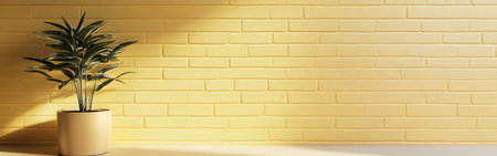 Brightly lit, a smooth pale yellow brick wall serves as a backdrop for a potted plant. The scene captures a moment of tranquility in a modern indoor environment, enhancing the space's warmth.の素材