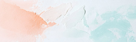 Gentle hues of peach, white, and seafoam mingle on a smooth canvas, creating a serene atmosphere perfect for artists seeking inspiration and calmness in their work.の素材