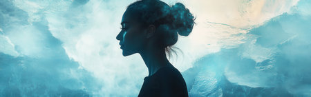 A woman stands in profile, exuding serenity and warmth. The soft glow around her creates a calming atmosphere, enhanced by the tranquil blue tones of the background, suggesting a quiet evening.の素材