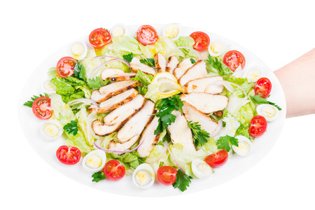 isolated fresh vegetable salad with meat slices on a plateの写真素材