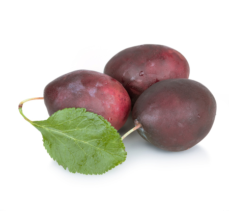 Fresh plum with drops isolated on white backgroundの写真素材
