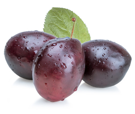 Fresh plum with drops isolated on white backgroundの写真素材