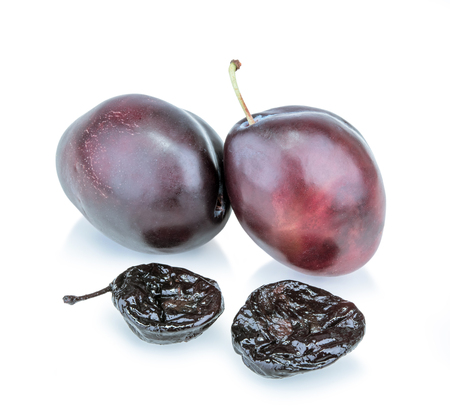 plums with prunes on white backgroundの写真素材