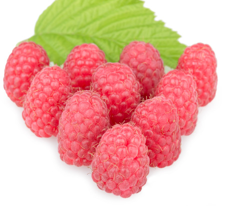 Fresh raspberry. Organic berry with green leaf isolated on whiteの写真素材
