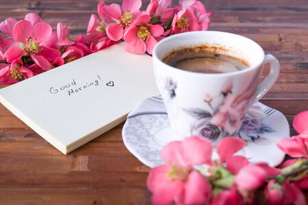 Good morning note with a cup of coffeeの写真素材