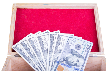 Dollars background wooden casket with red fringeの写真素材