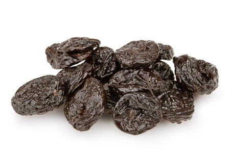 Close up of pitted prunes isolated on white backgroundの写真素材