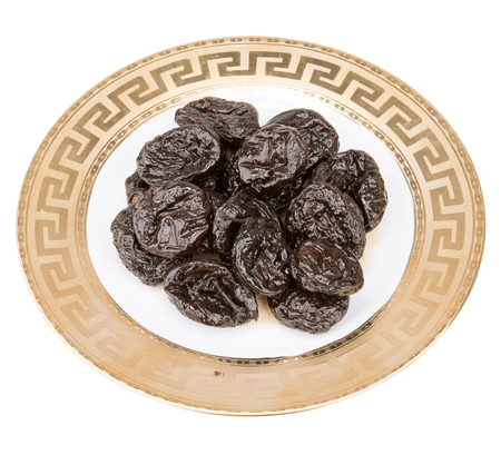 Close up of pitted prunes isolated on white backgroundの写真素材