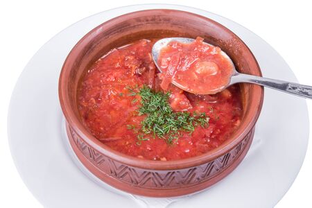 An isolated plate of borscht. Delicious freshly prepared foodの写真素材