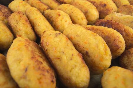 Natural, homemade fish cutlets on a large trayの写真素材